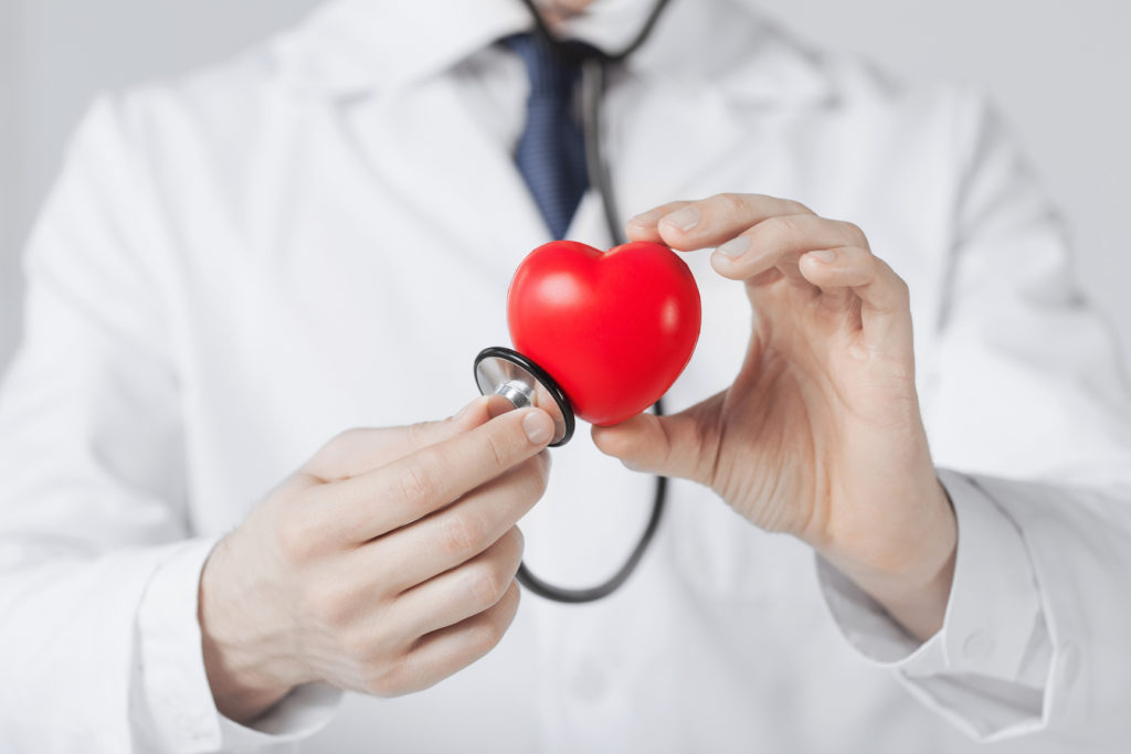 close up of man hands with heart